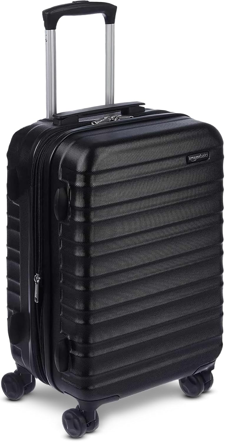 Amazon Basics Mała Walizka Twarda - Rozszerzalny Bagaż Podręczny ABS z 4 Podwójnymi Kółkami Obrotowymi - Odporna na Zarysowania i Lekka - 55 x 37,5 x 25,5cm - Czarny